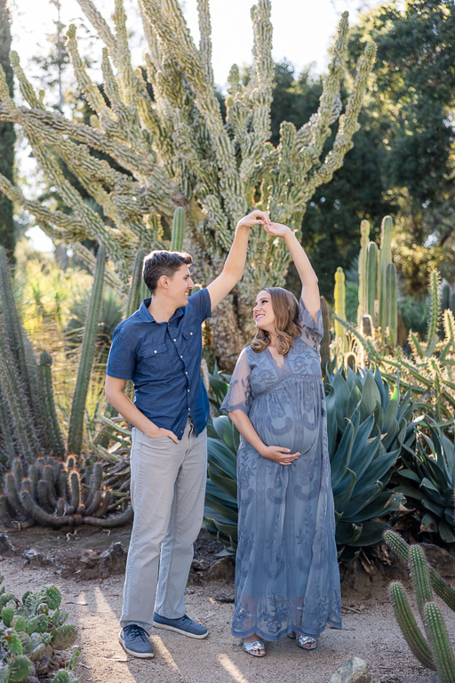 a dancing pose for maternity photos