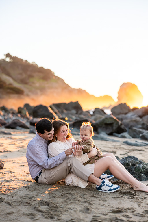 sitting down family photos with baby