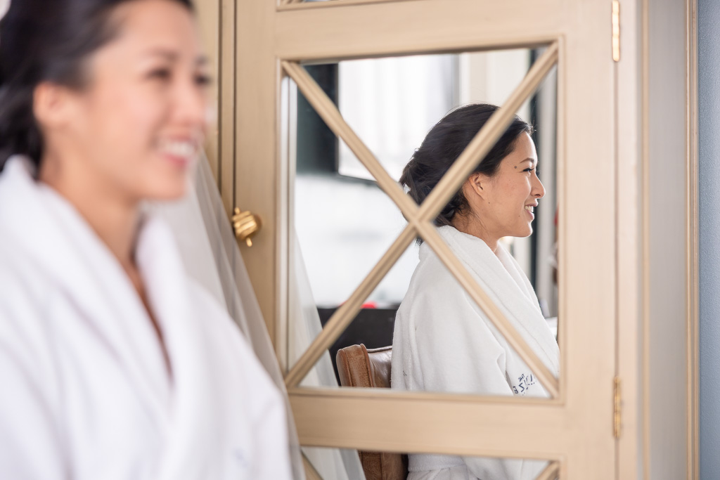 candid photo of the bride getting ready