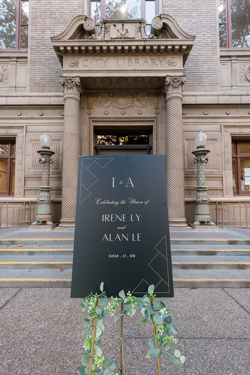 wedding welcome sign in front of Tsakopoulos Library Galleria