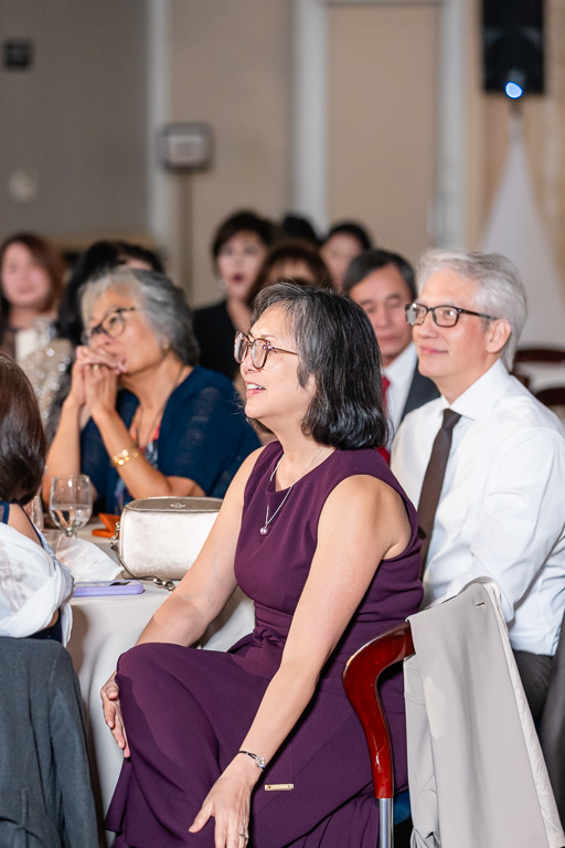parents listening to the dinner speeches
