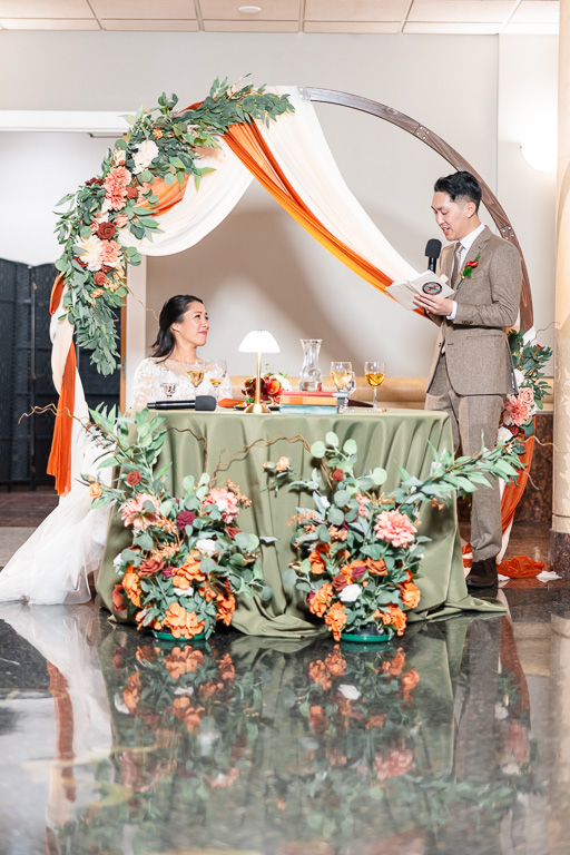 groom giving a very eloquent speech