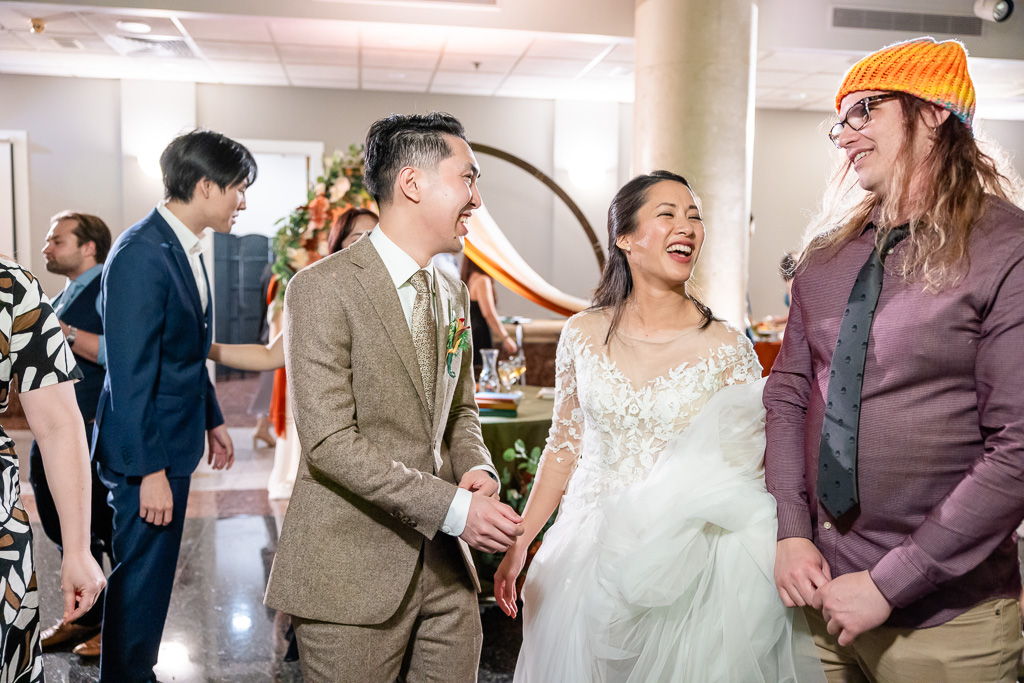 newlyweds having a great time on the dance floor