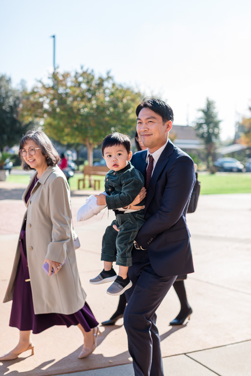 wedding guests arriving at church