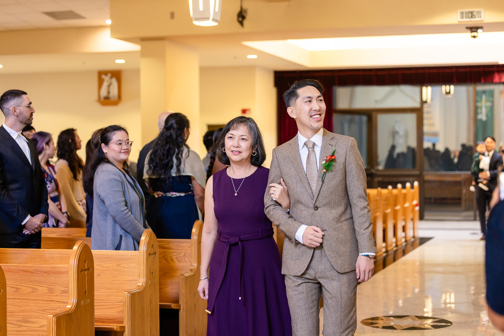 groom walking up the aisle at church