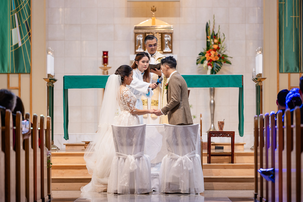 groom saying wedding vows at church
