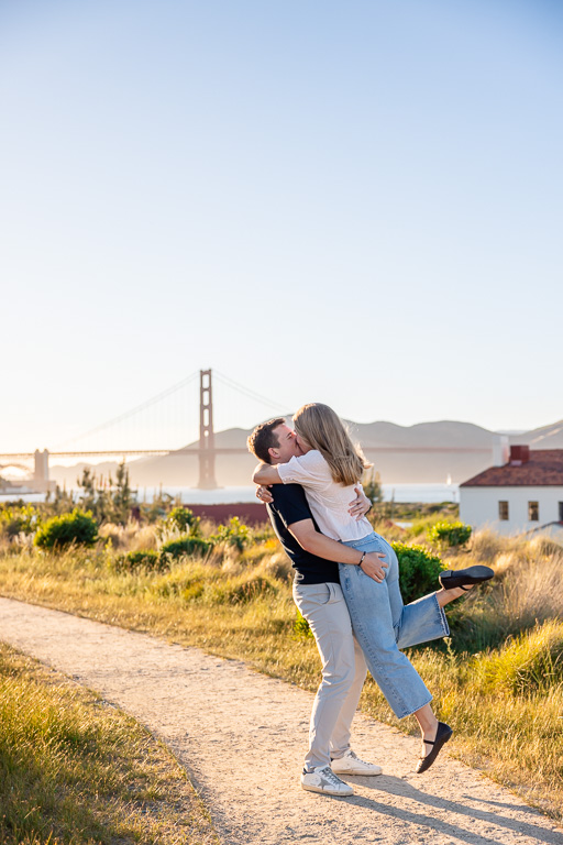 picking her up and swinging her around