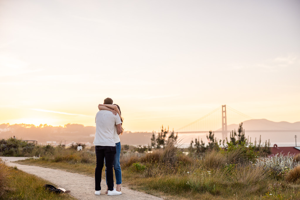 just got engaged in the Presidio near the Golden Gate Bridge