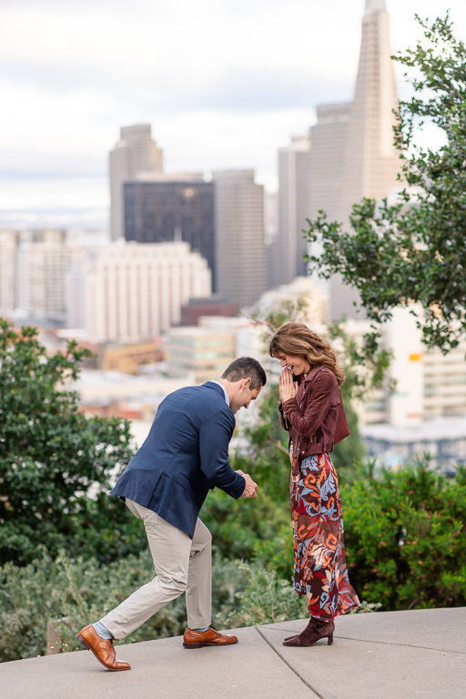 bending down on one knee to propose