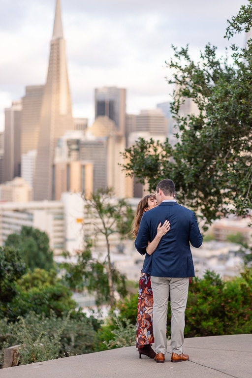 sneaking a photo of a kiss