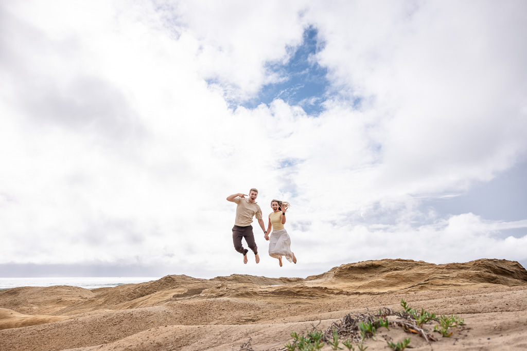 jumping into the air engagement photo pic