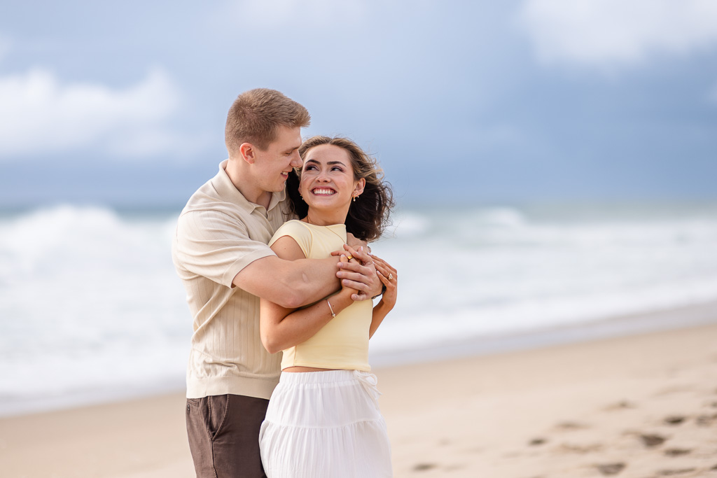 close-up pose for engagement photos on the beach