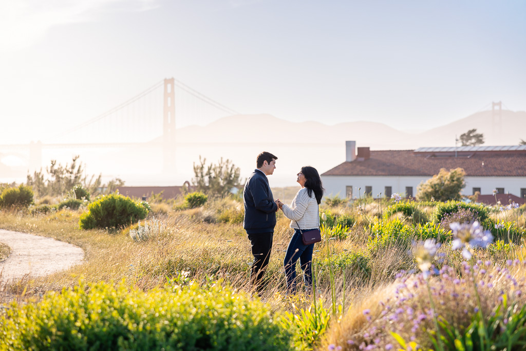 a couple standing in the garden of the Presidio Tunnel Tops at golden hour