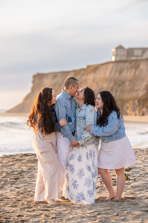 parents and adult children together in a family photo shoot