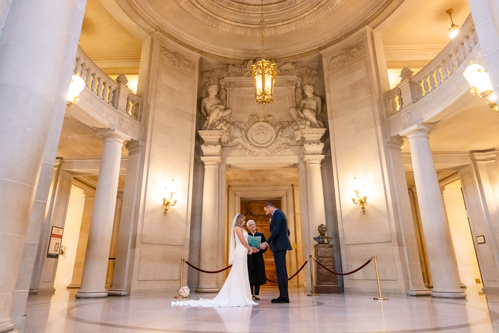 wide angle view of SF City Hall civil ceremony