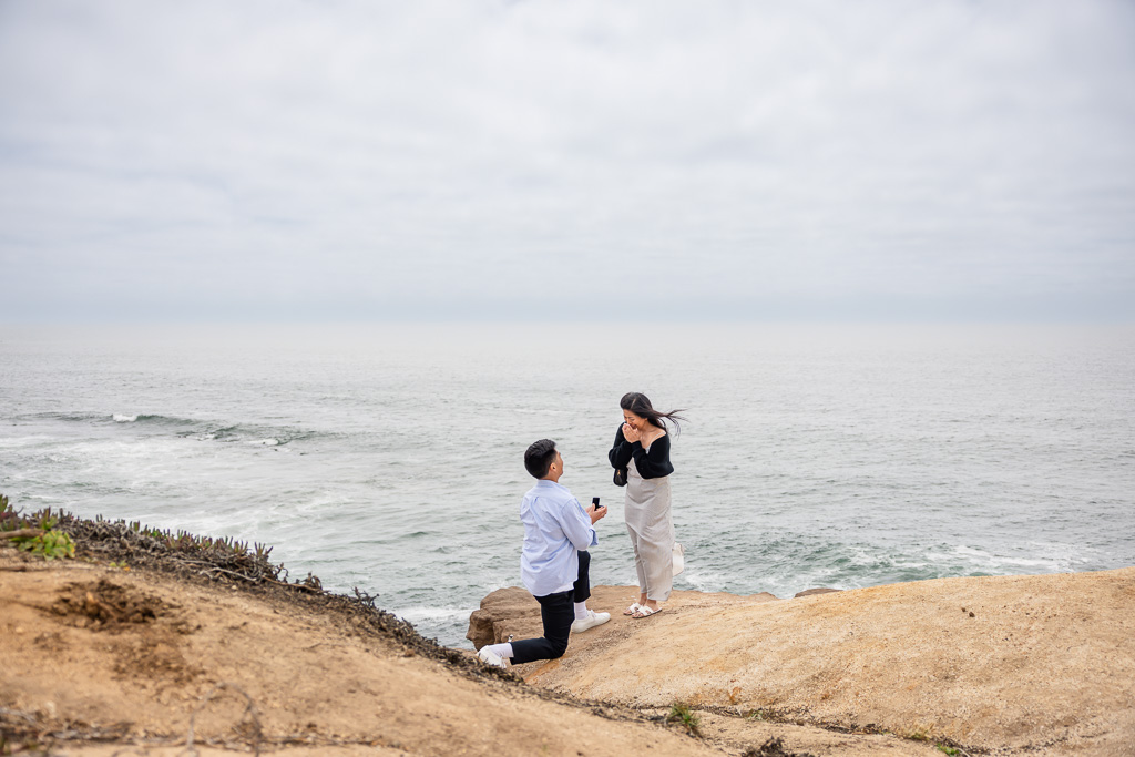 proposal at Montara State Beach near the rocky shoreline