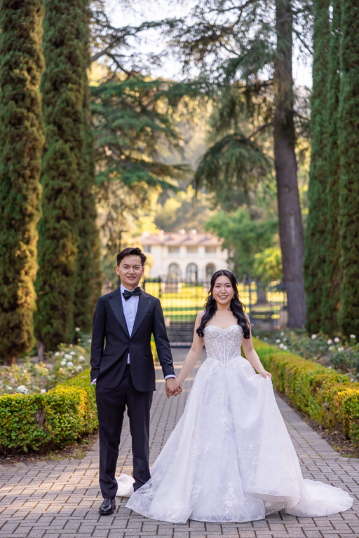 portrait of bride and groom facing the camera at Montalvo Arts Center