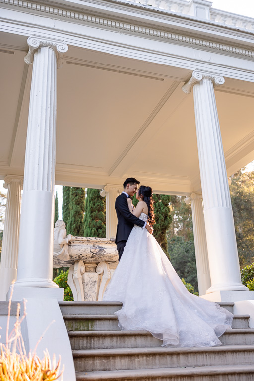 bride and groom wedding day photo at the Italianate Garden near the sculpture
