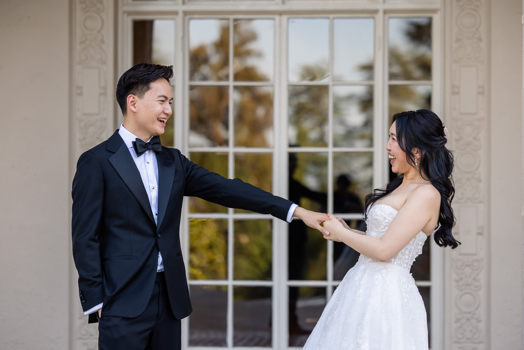a cute candid moment between the bride and groom