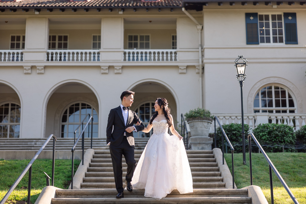 bride and groom walking down the steps of the veranda at the Montalvo Arts Center