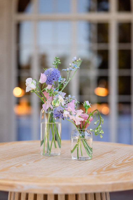 cocktail hour bar table flowers