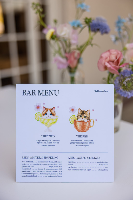custom bar signage from the bride and groom with colorful signature cocktails