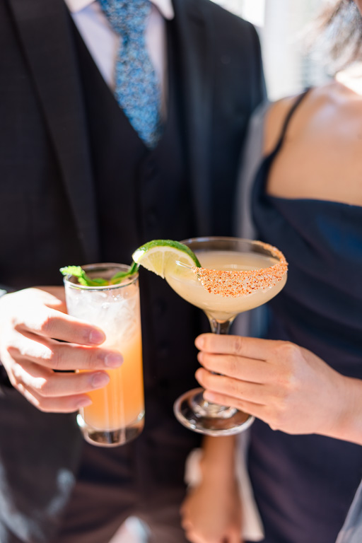 some wedding guests enjoying the signature cocktails