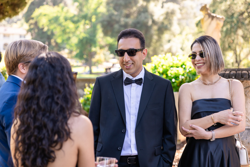 wedding guests mingling during cocktail hour