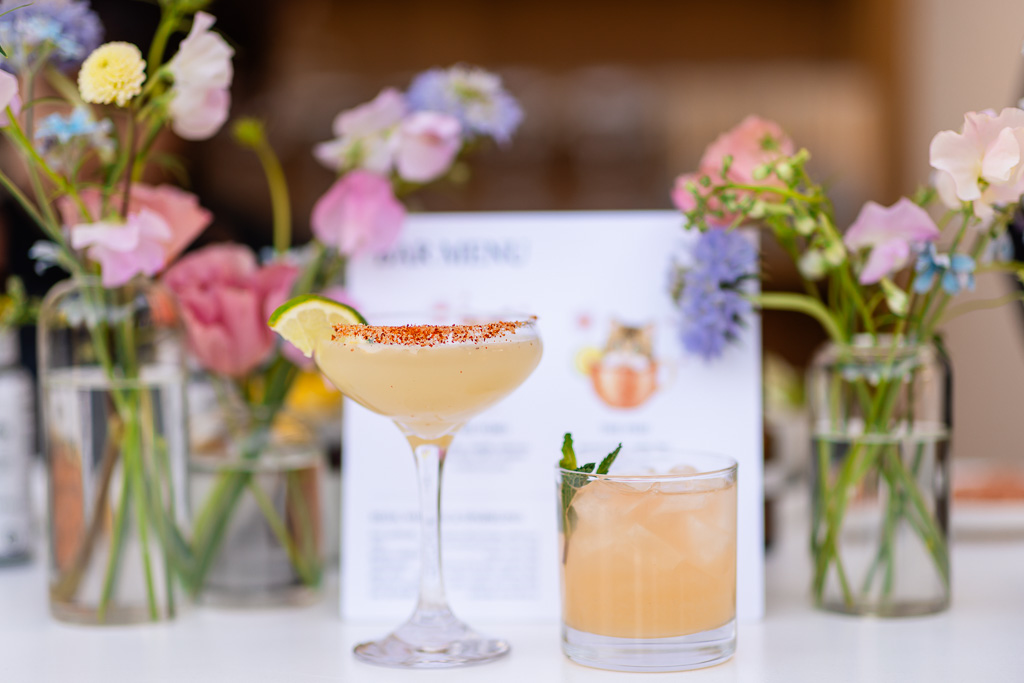 bride and groom drinks at the bar