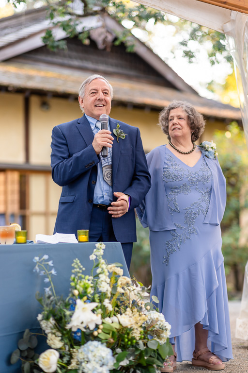 parents of the bride giving a toast