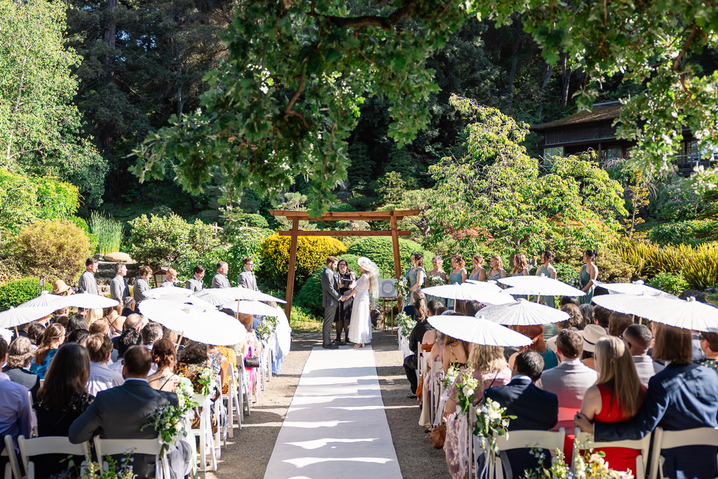 Hakone Gardens wedding ceremony with custom wooden wedding arbor
