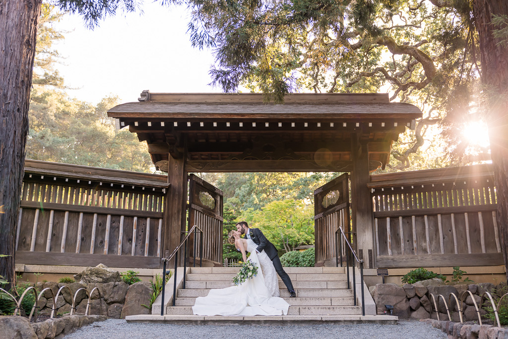 golden hour wedding portraits at the wooden gate of Hakone Gardens
