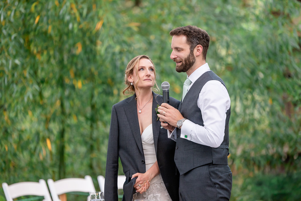 bride and groom giving their thank-you speech