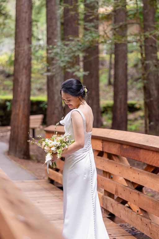 bridal solo photo on a wooden bridge in the woods