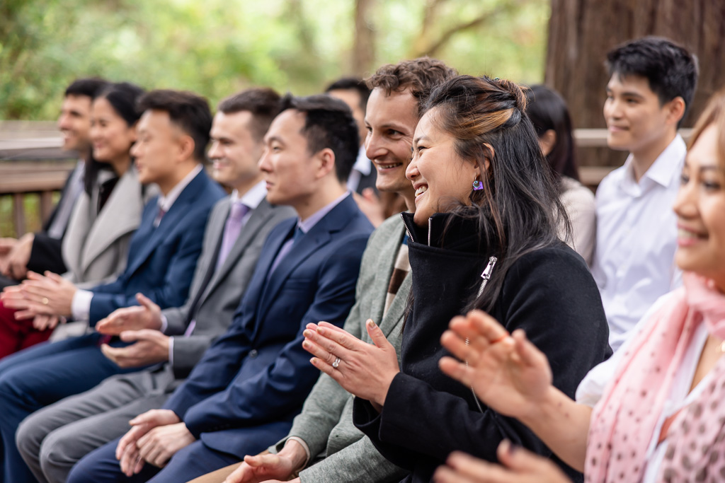 guests clapping during wedding ceremony