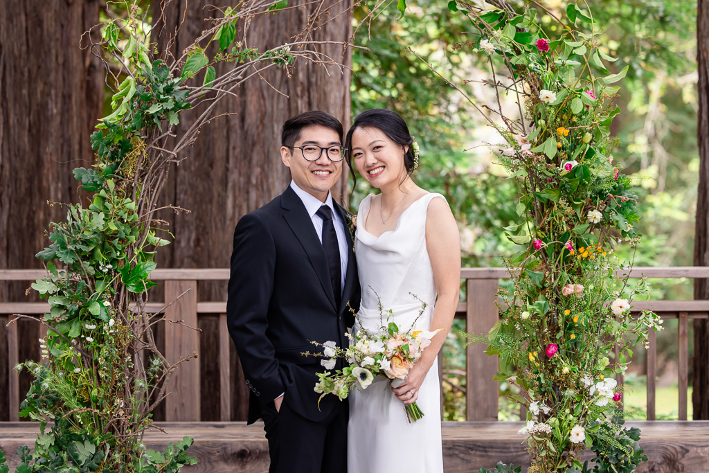 bride and groom back at the altar for a wedding portrait