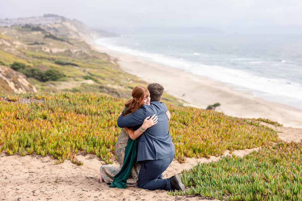 a warm and emotional hug after she said yes