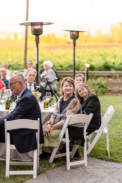 wedding guests reacting to a great speech