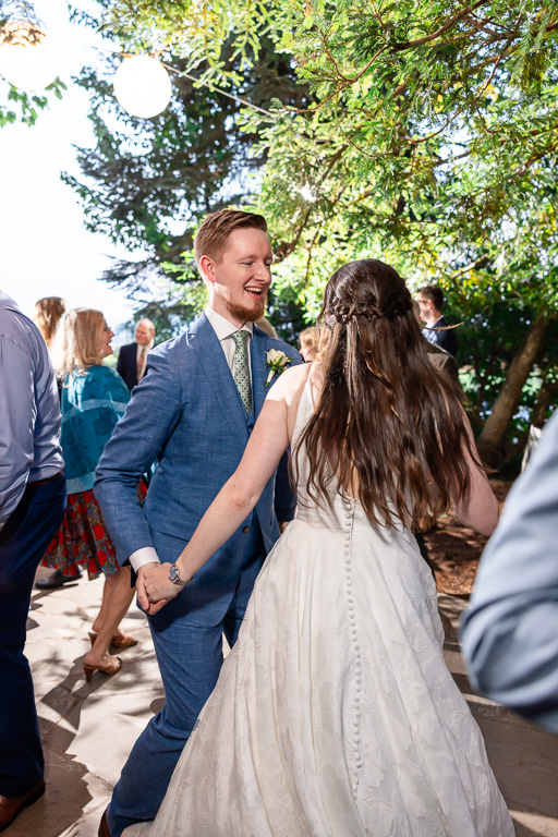 bride and groom dancing on the open dance floor