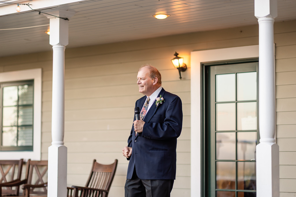 father giving a dinner toast