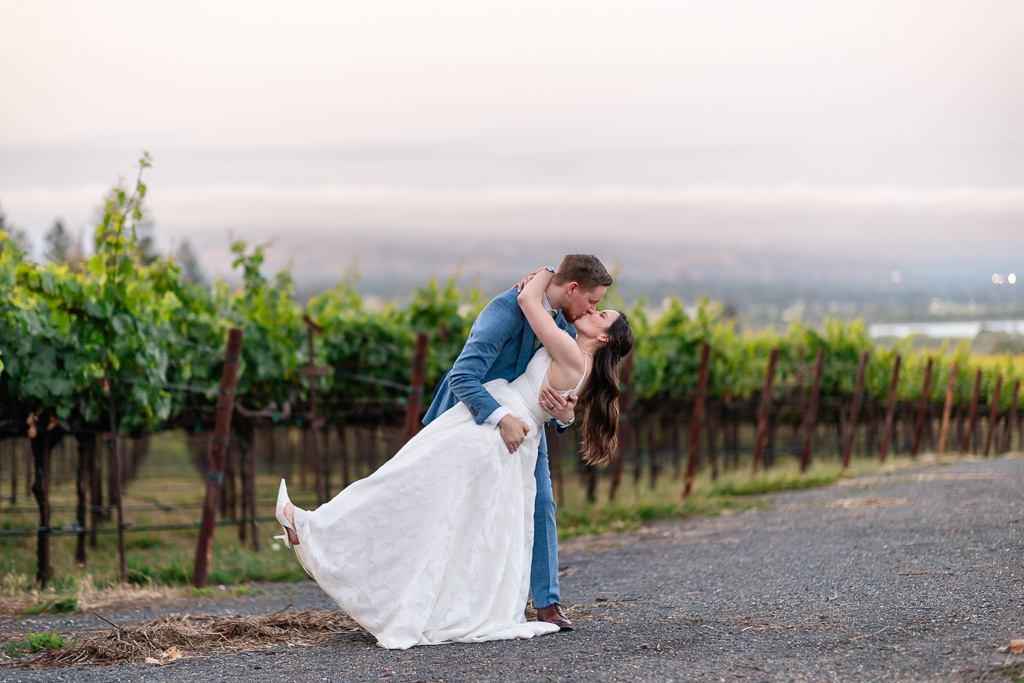 bride and groom dip & kiss