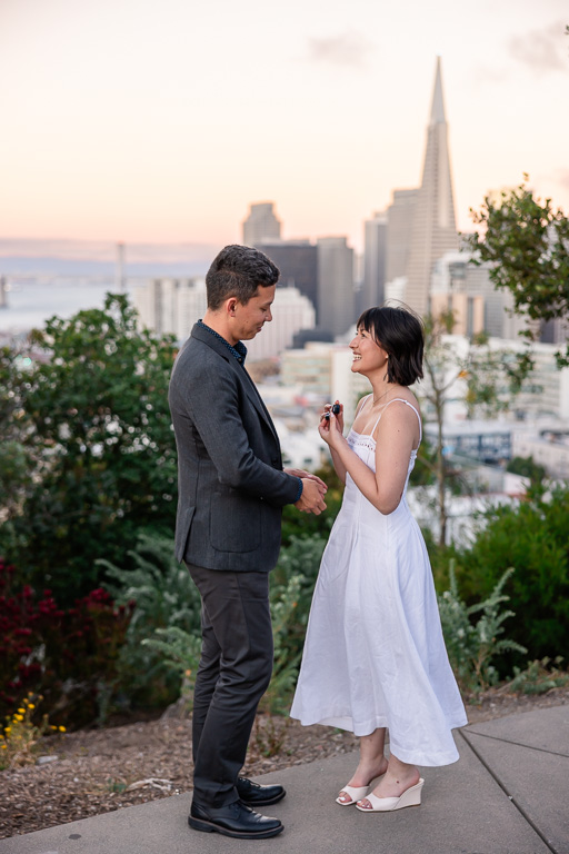 girl proposing back to her boyfriend after he just proposed