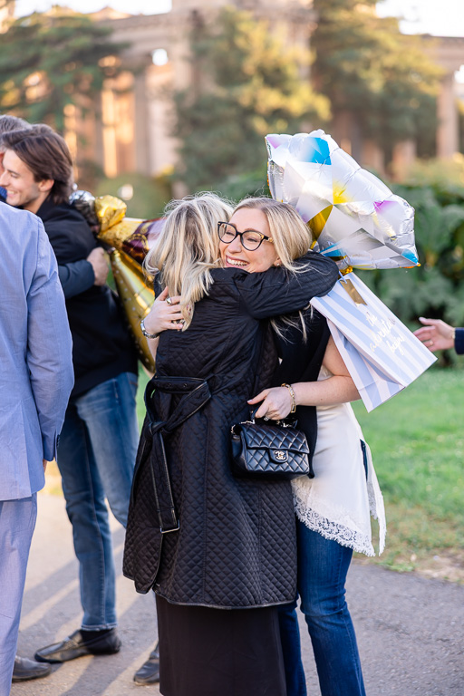 bride-to-be hugging mom after getting engaged