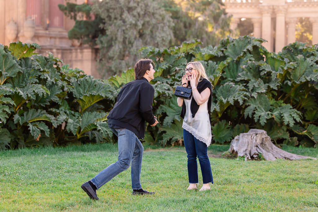 bending down on one knee to propose