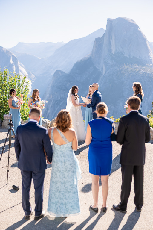 parents looking on as daughter and son get married at Glaciere Point