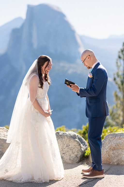 groom reading his personal wedding vows at Glacier Point