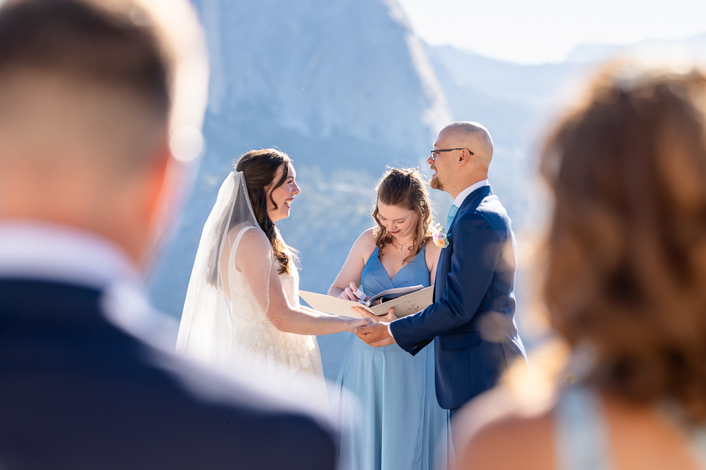 a cute candid moment during wedding ceremony at Glacier Point