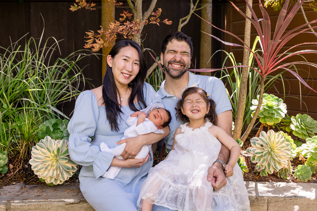 silly funny family photo of daddy and daughter matching poses