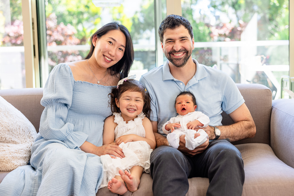 in-home family photos with parents and two young children