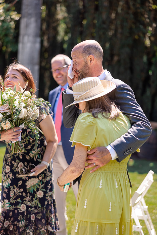 groom with some wedding guests during cocktail hour